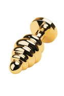 Golden anal plug with black gem